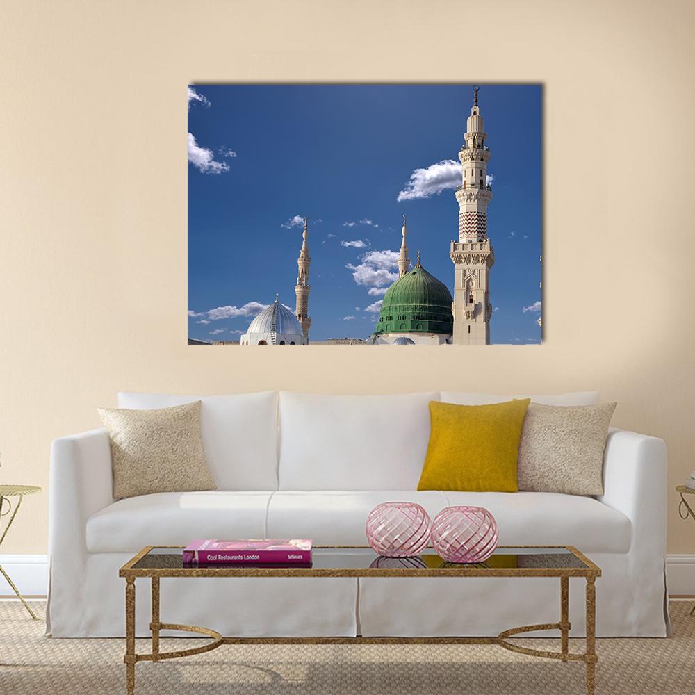 Medinah Mosque Canvas Wall Art in beige, green and blue, single panel hung on a wall