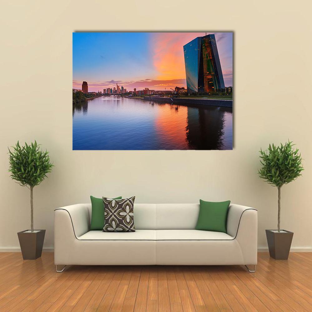 Frankfurt Skyline at Sunset Canvas Wall Art in orange, blue and pink, single panel hung on a wall