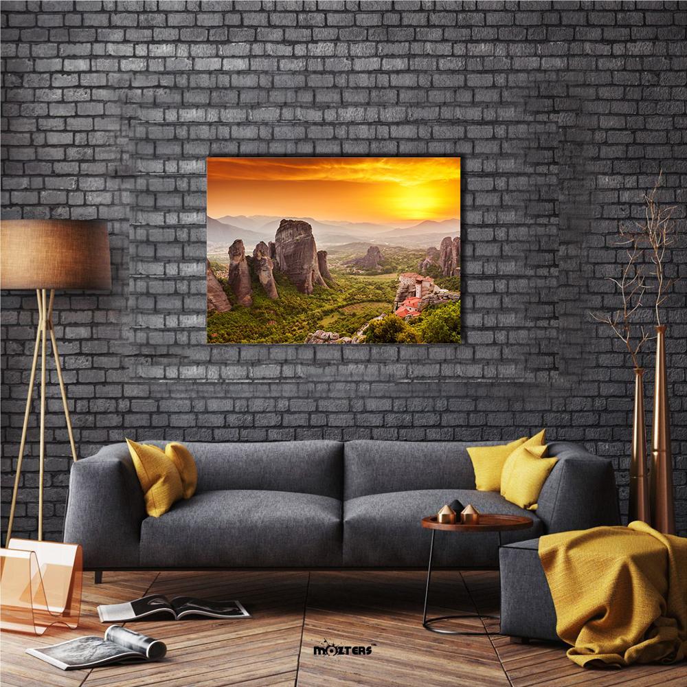 Monastery of Rousanou at Sunset Canvas Wall Art in orange, yellow and green, single panel hung on a wall