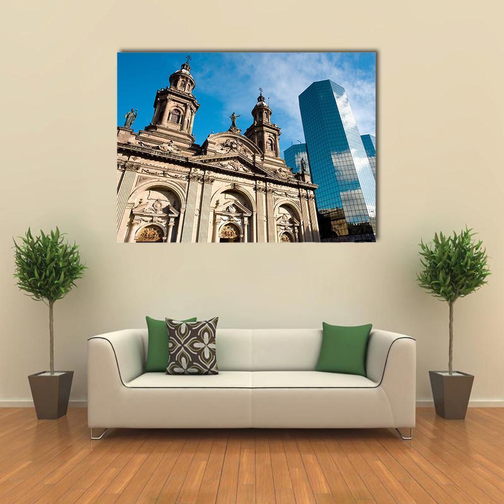 Metropolitan Cathedral and Glass Skyscraper Canvas Wall Art in gray, beige and blue, single panel hung on a wall