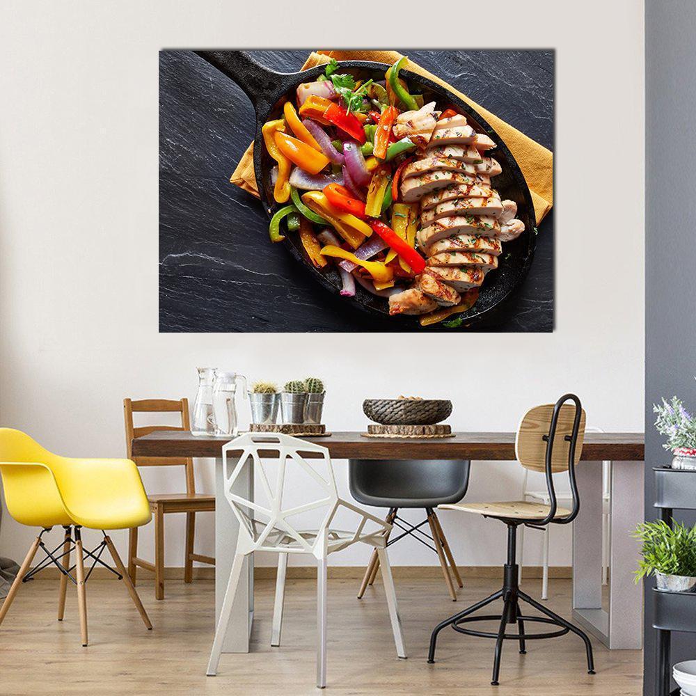 Mexican Grilled Chicken Fajitas Canvas Wall Art in black, yellow and multicolor, single panel hung on a wall
