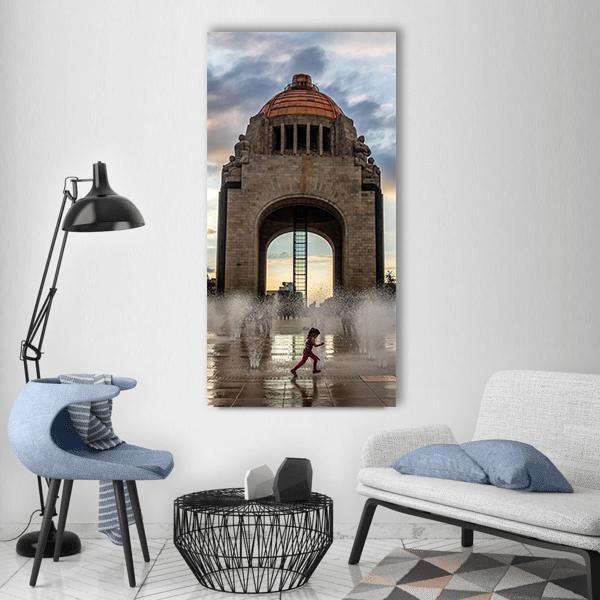 Monumento a La Revolución at Dusk Vertical Canvas Wall Art in gray, orange and blue, single vertical panel hung on a wall
