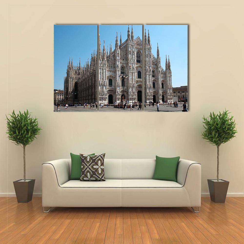 Milan Cathedral Canvas Wall Art in white, gray and blue, 3 panel horizontal set hung on a wall