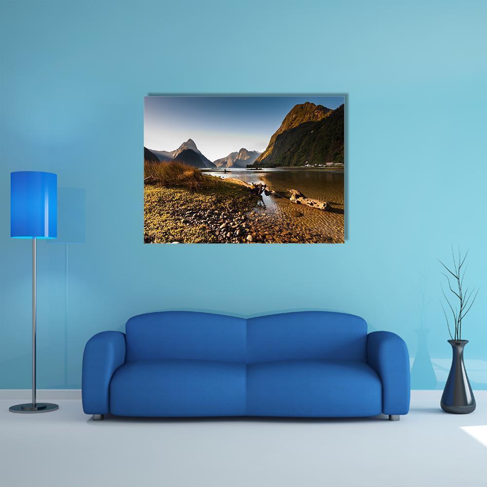 Milford Sound Shoreline at Late Afternoon Canvas Wall Art in brown, green and blue, single panel hung on a wall
