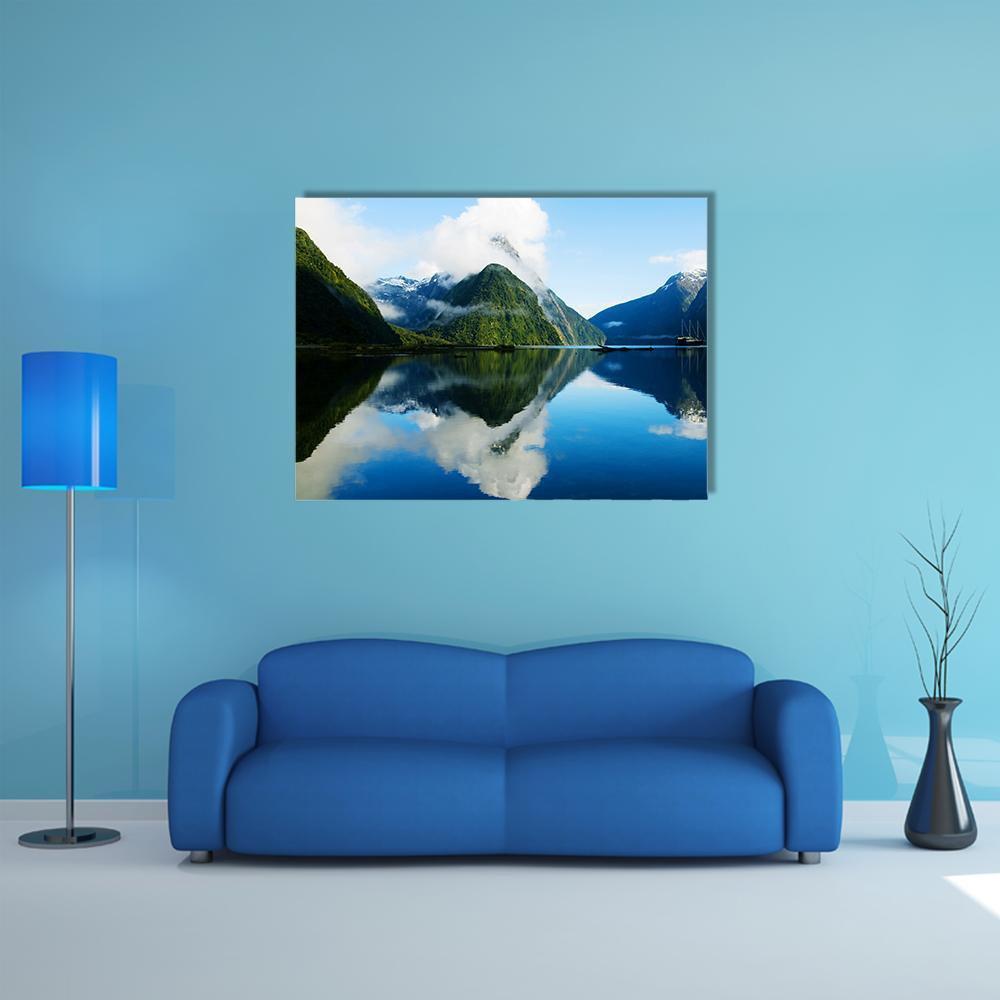 Milford Sound, New Zealand Reflection Canvas Wall Art in white, green and blue, single panel hung on a wall