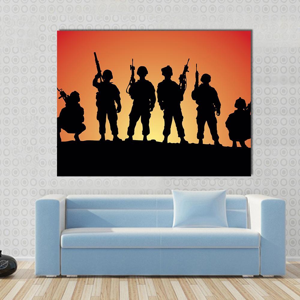 Military Soldiers Silhouettes Canvas Wall Art in black, orange and yellow, single panel hung on a wall