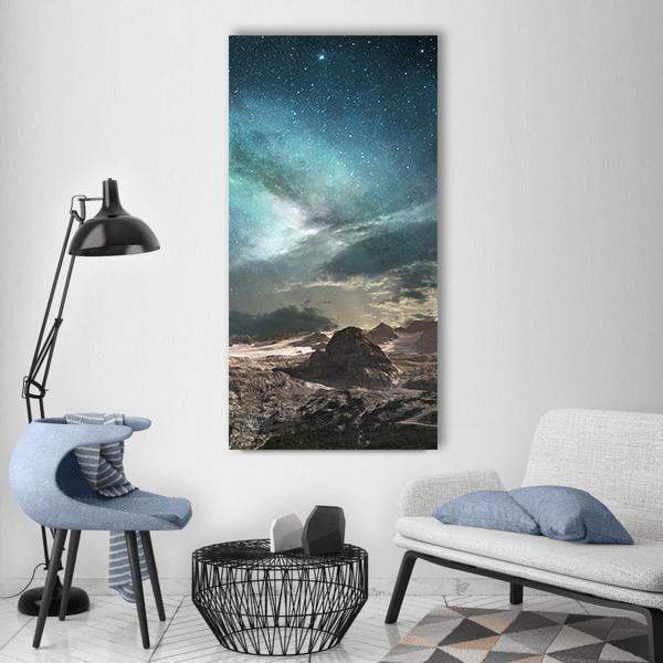 Milky Way at Dawn Vertical Canvas Wall Art in black, gray and blue, single vertical panel hung on a wall