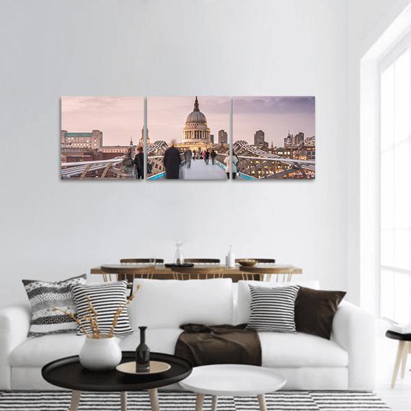People on Millennium Bridge, St Paul's Cathedral Panoramic Canvas Wall Art in gray, beige and pink, hung on a wall