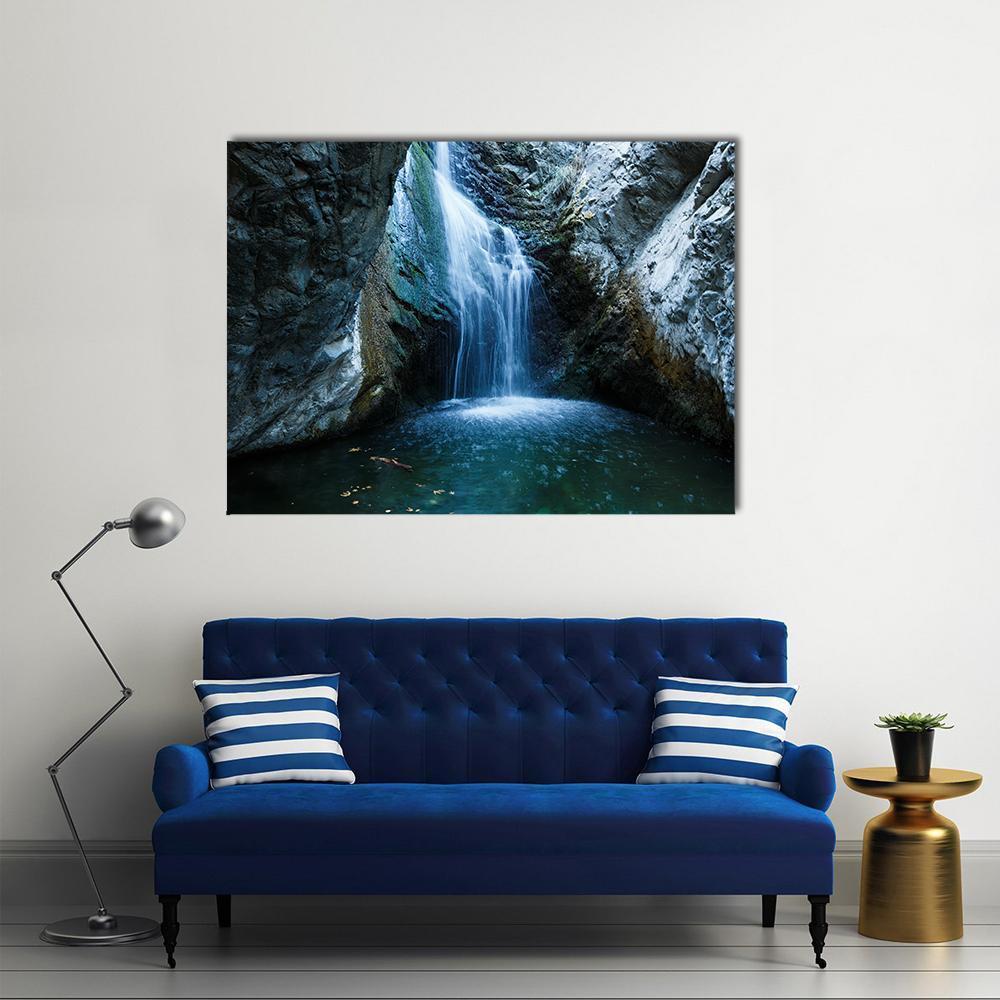 Millomeri Waterfalls Canvas Wall Art in black, gray and blue, single panel hung on a wall