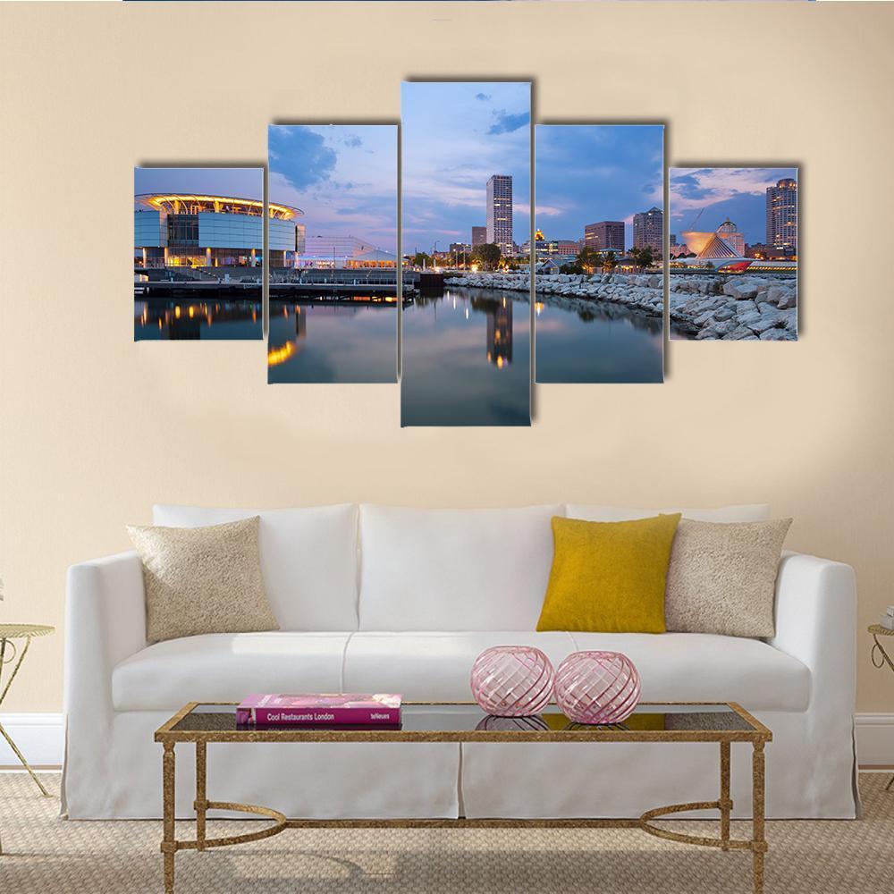 Milwaukee Skyline at Dusk Canvas Wall Art in gray, gold and blue, 5 panel Star layout hung on a wall