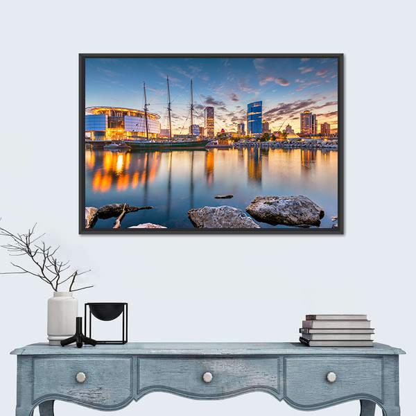 Milwaukee Harbor Skyline at Sunset Canvas Wall Art in orange, yellow and blue, framed canvas, product view on a white background