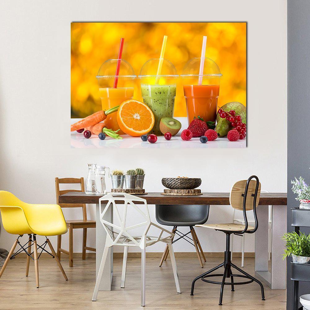 Fresh Juice Mix Fruit Canvas Wall Art in orange, yellow and green, single panel hung on a wall
