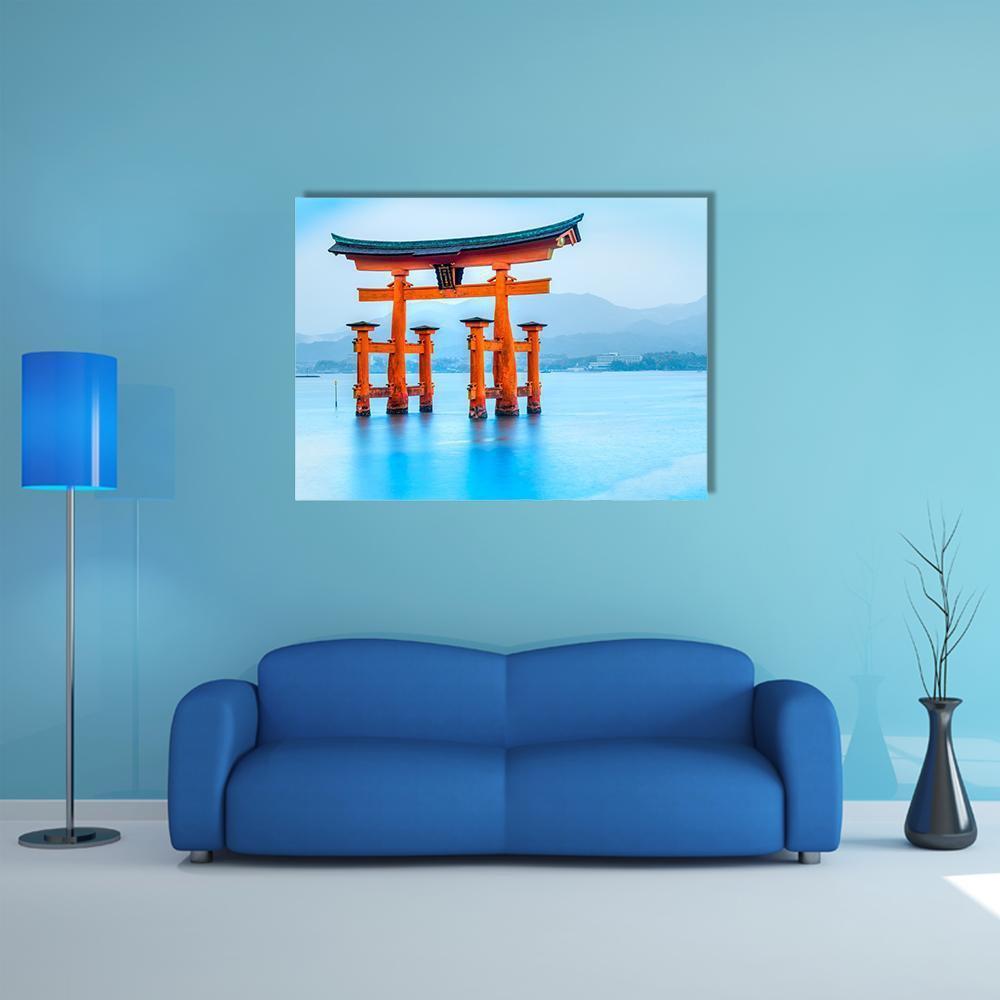 Floating Torii Gate in Japan Canvas Wall Art in orange and blue, single panel hung on a wall