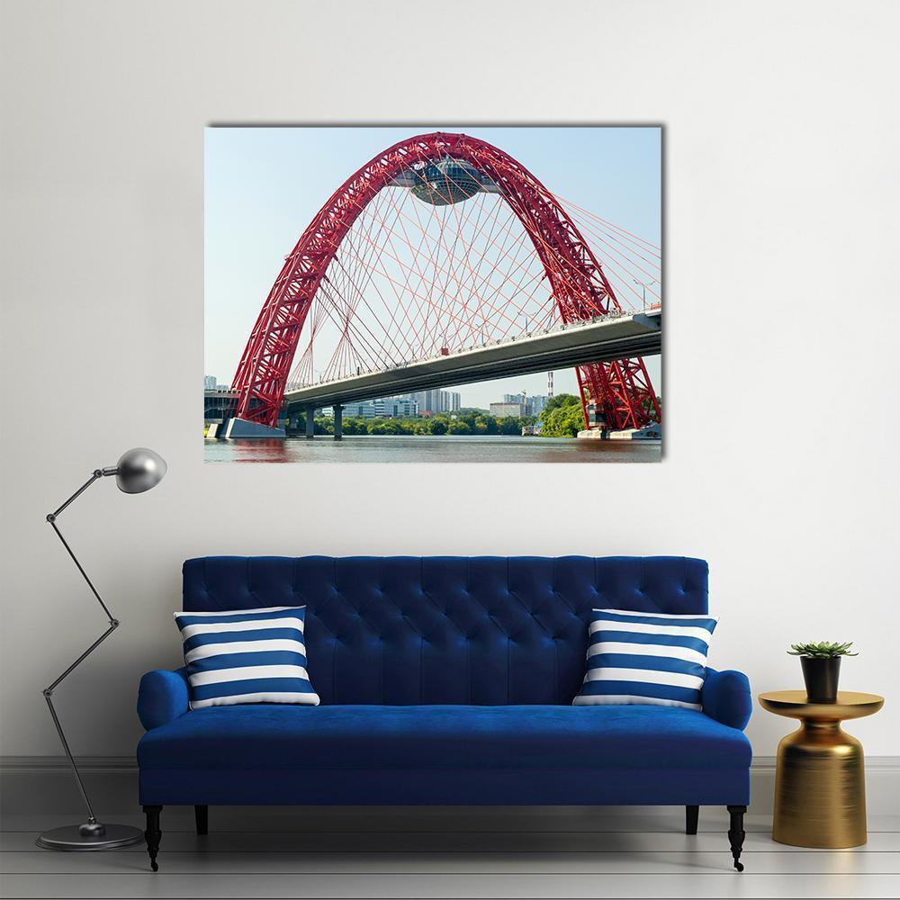 Red Arched Cable-stayed Bridge Canvas Wall Art in gray, red and blue, single panel hung on a wall