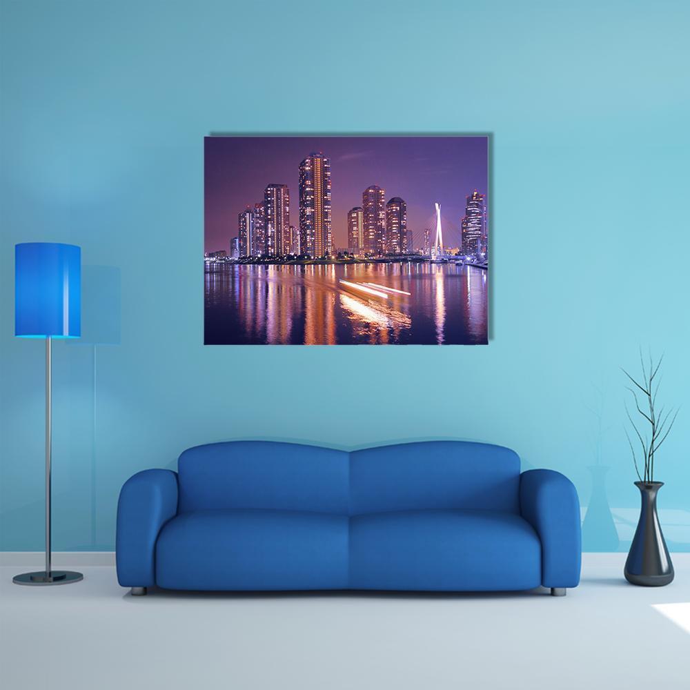 Tokyo Night Skyline with Reflections Canvas Wall Art in orange, blue and purple, single panel hung on a wall