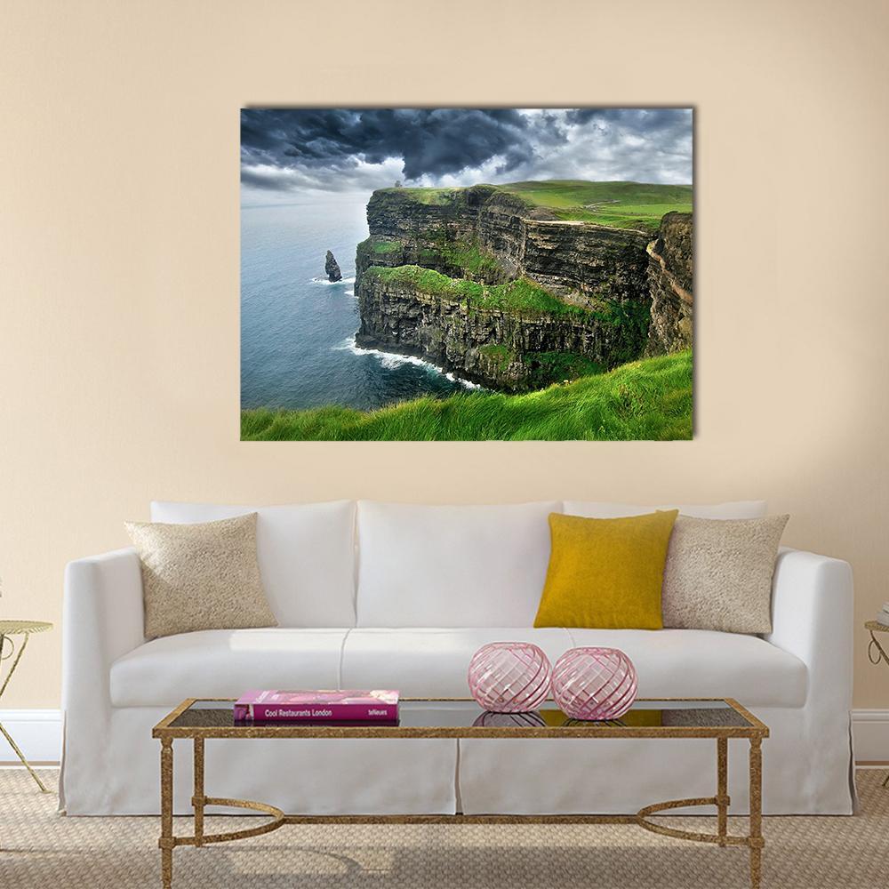 Moher Cliffs Under Clouds Canvas Wall Art in gray, green and blue, single panel hung on a wall