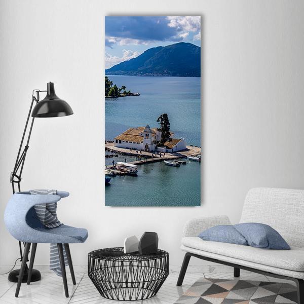 Vlacherna Monastery Greece Vertical Canvas Wall Art in white and blue, single vertical panel hung on a wall