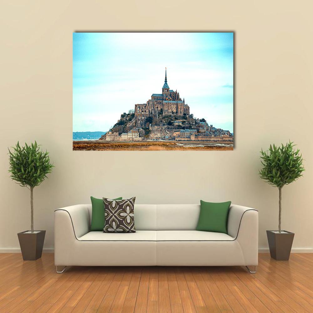 Mont-saint-michel Abbey Canvas Wall Art in white, brown and blue, single panel hung on a wall