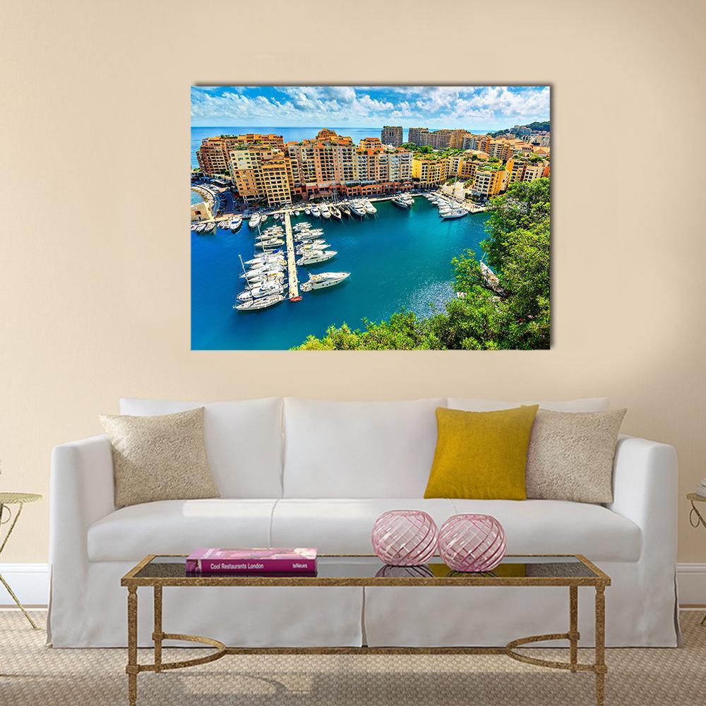 Monte Carlo Bay Marina, Monaco Canvas Wall Art in orange, green and blue, single panel hung on a wall