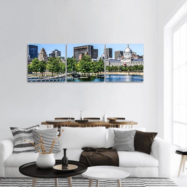 Montreal Lakefront Skyline Panoramic Canvas Wall Art in gray, green and blue, hung on a wall