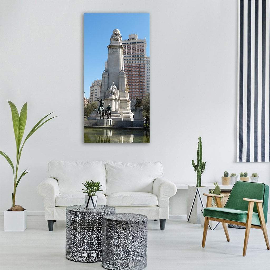 Madrid Monument with Equestrian Statue Vertical Canvas Wall Art in gray, beige and blue, single vertical panel hung on a wall