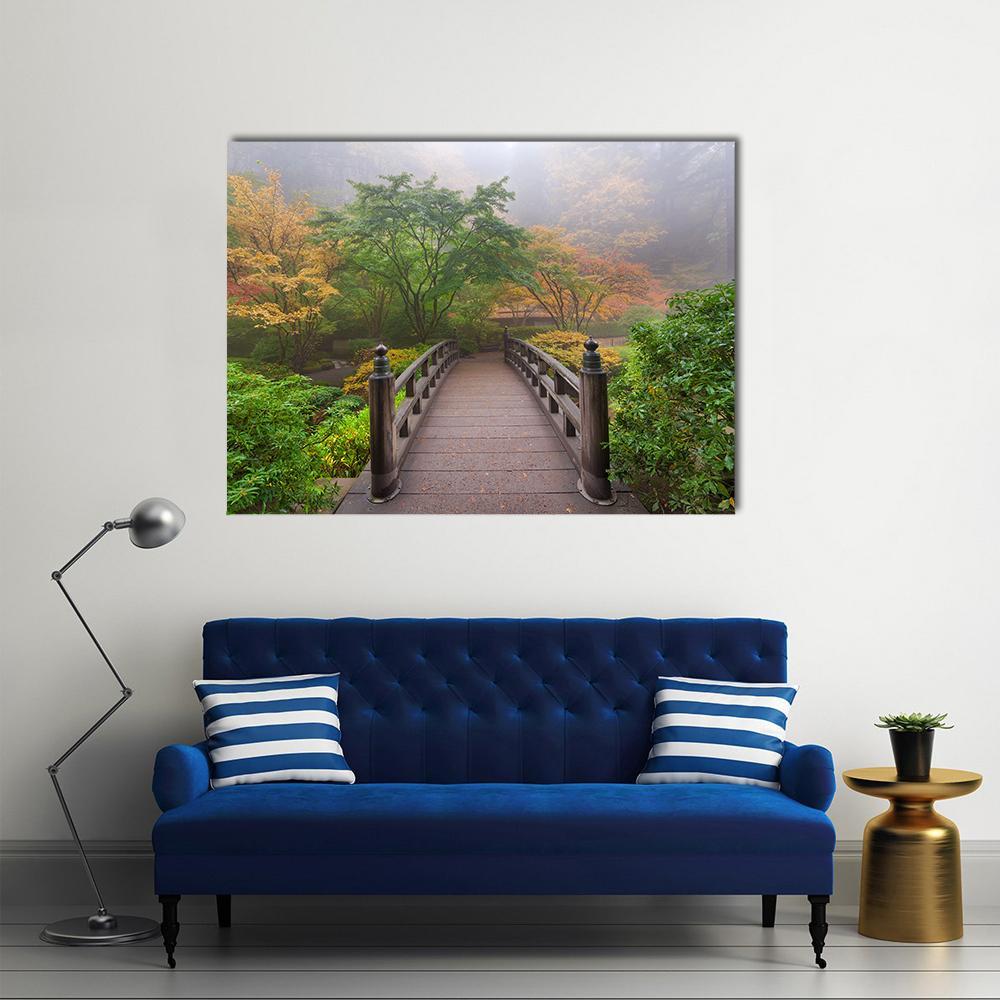 Autumn Moon Over Wooden Bridge Canvas Wall Art in brown, yellow and green, single panel hung on a wall