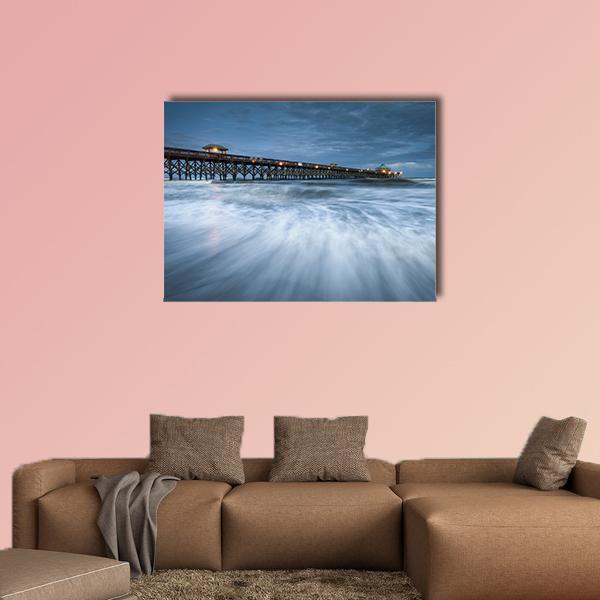 Folly Beach Pier at Night Canvas Wall Art in white, blue and navy, single panel hung on a wall