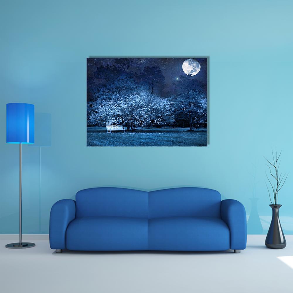 Full Moon Over Park Bench Canvas Wall Art in white, blue and navy, single panel hung on a wall