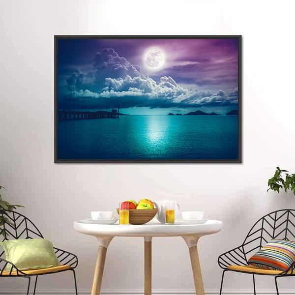 Moonlit Seascape with Wooden Pier Canvas Wall Art in blue, navy and purple, framed canvas, product view on a white background