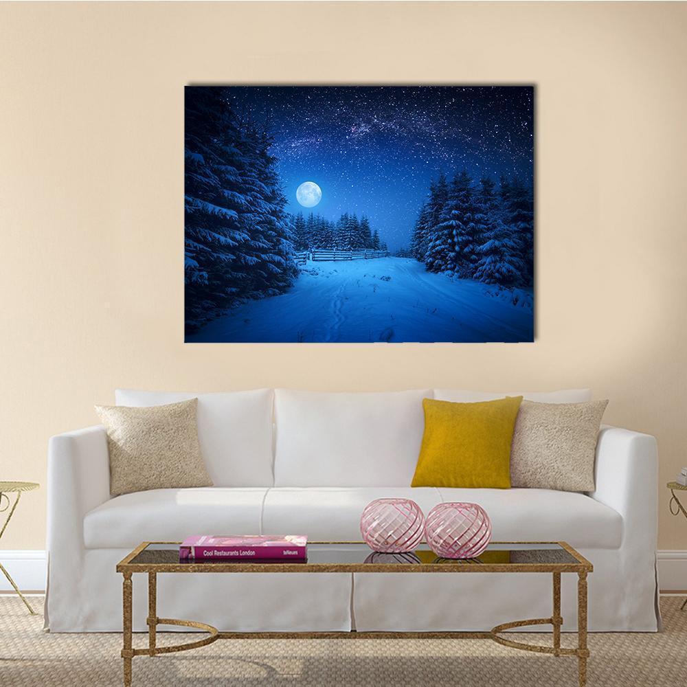 Moonlit Winter Path Under Starry Sky Canvas Wall Art in white, blue and navy, single panel hung on a wall