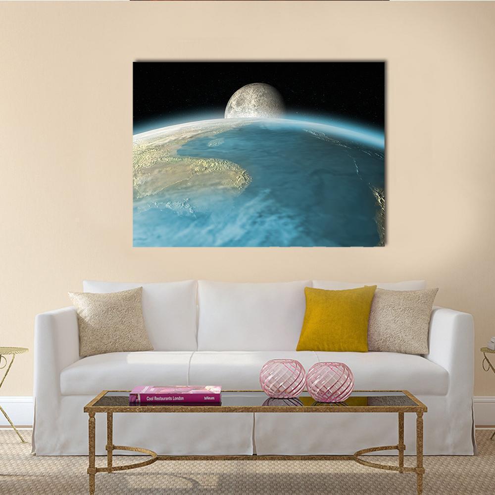 Moon Rising Over Earth Canvas Wall Art in black, gray and blue, single panel hung on a wall