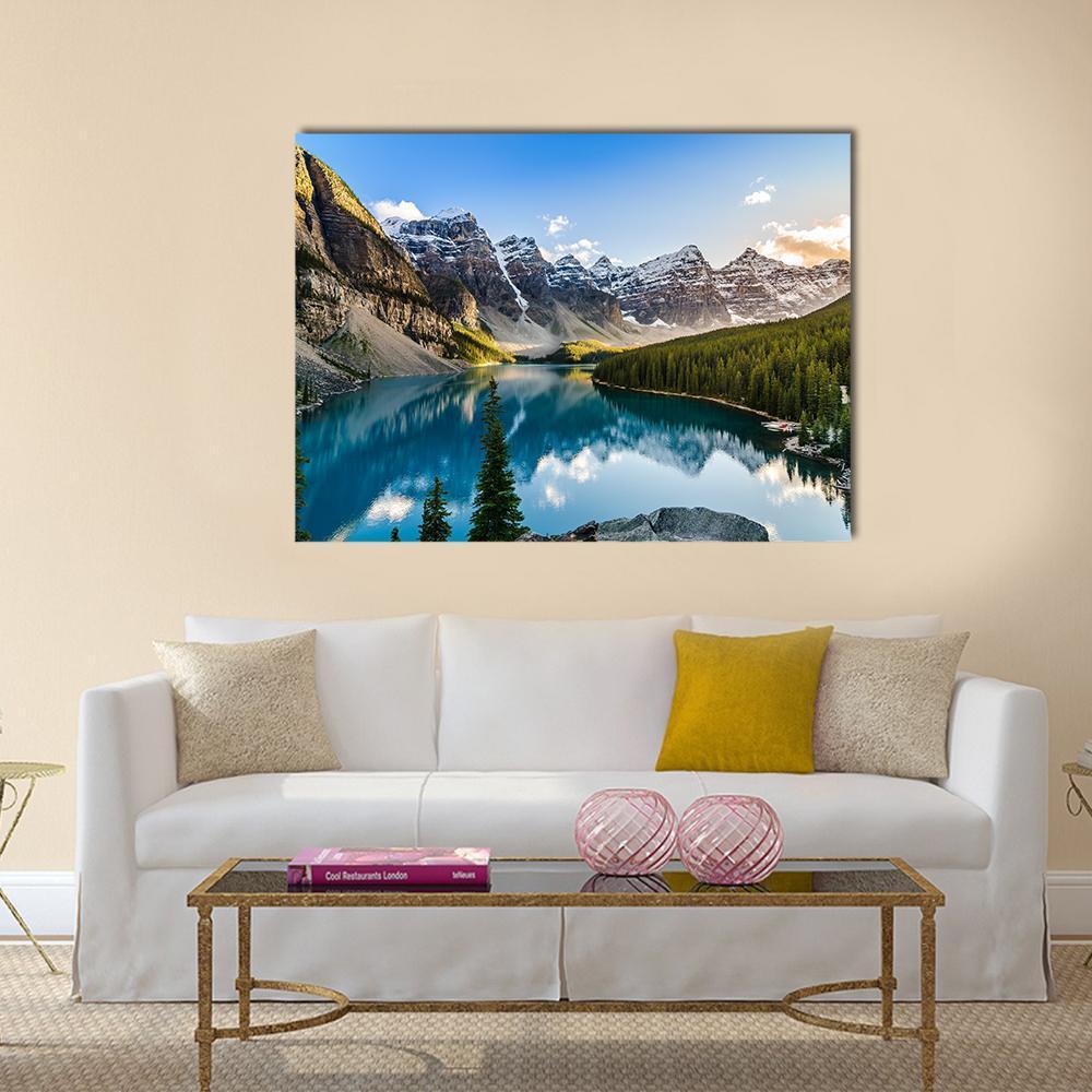 Serene Moraine Lake and Snow-capped Mountains Canvas Wall Art in gray, green and blue, single panel hung on a wall