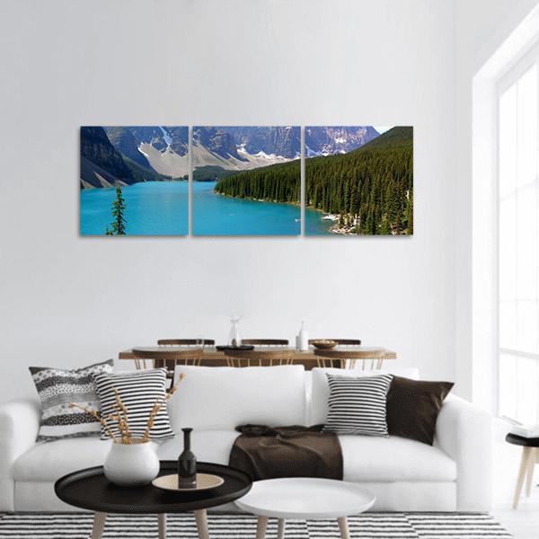 Moraine Lake Turquoise View Panoramic Canvas Wall Art in gray, green and blue, hung on a wall