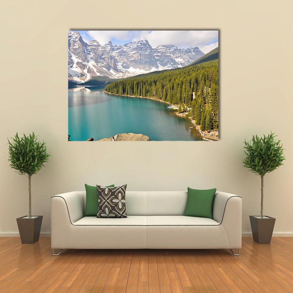 Moraine Lake Reflections with Rocky Mountains Canvas Wall Art in gray, green and blue, single panel hung on a wall