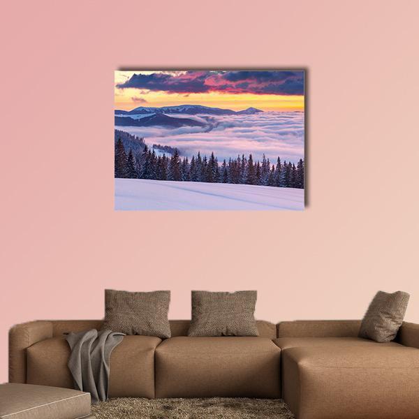 Fog Over Winter Mountains at Sunset Canvas Wall Art in orange, purple and pink, single panel hung on a wall