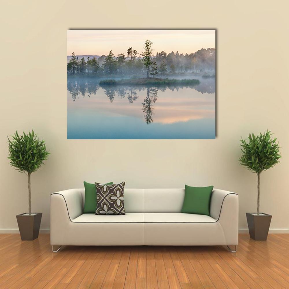 Morning Fog on Lake Canvas Wall Art in orange, green and blue, single panel hung on a wall
