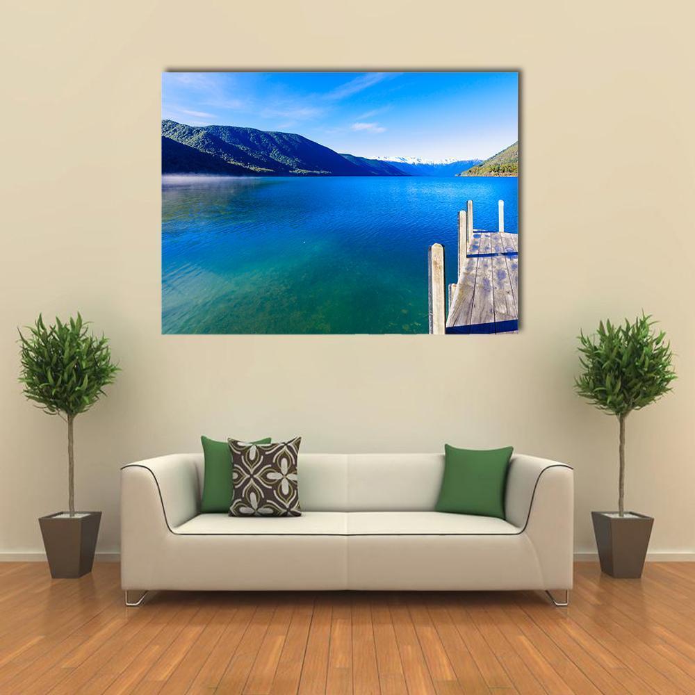 Nelson Lake Pier with Mountains Canvas Wall Art in white, green and blue, single panel hung on a wall