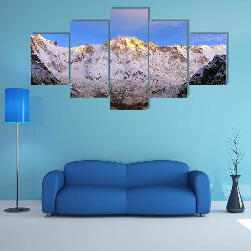 Annapurna Massif Snowy Peaks Canvas Wall Art in white, gold and blue, 5 panel Star layout hung on a wall