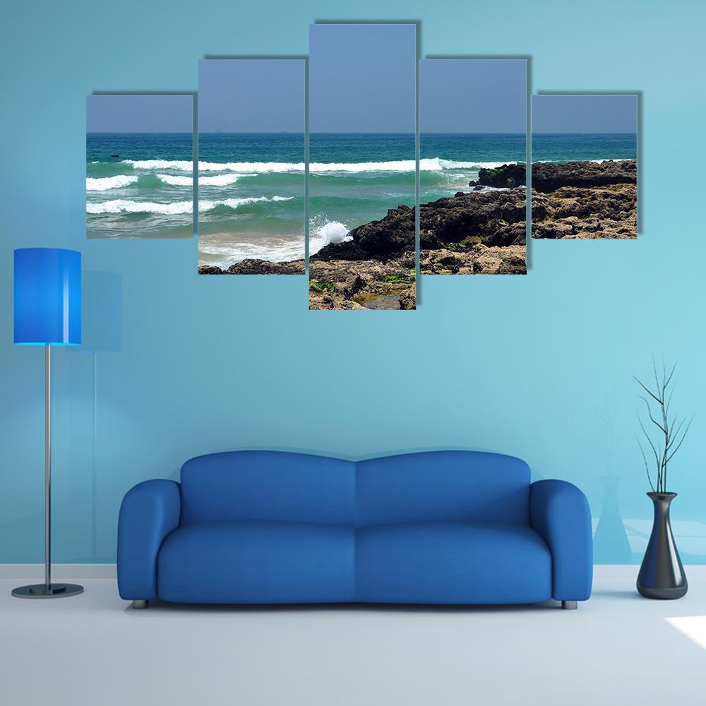 Taghazout Bay Rocky Shore Seascape Canvas Wall Art in white, brown and blue, 5 panel Star layout hung on a wall