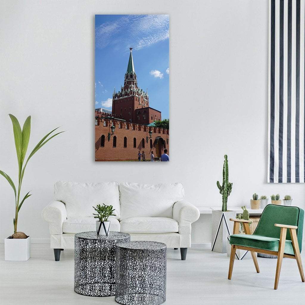 Kremlin Tower and Red Brick Vertical Canvas Wall Art in brown, red and blue, single vertical panel hung on a wall