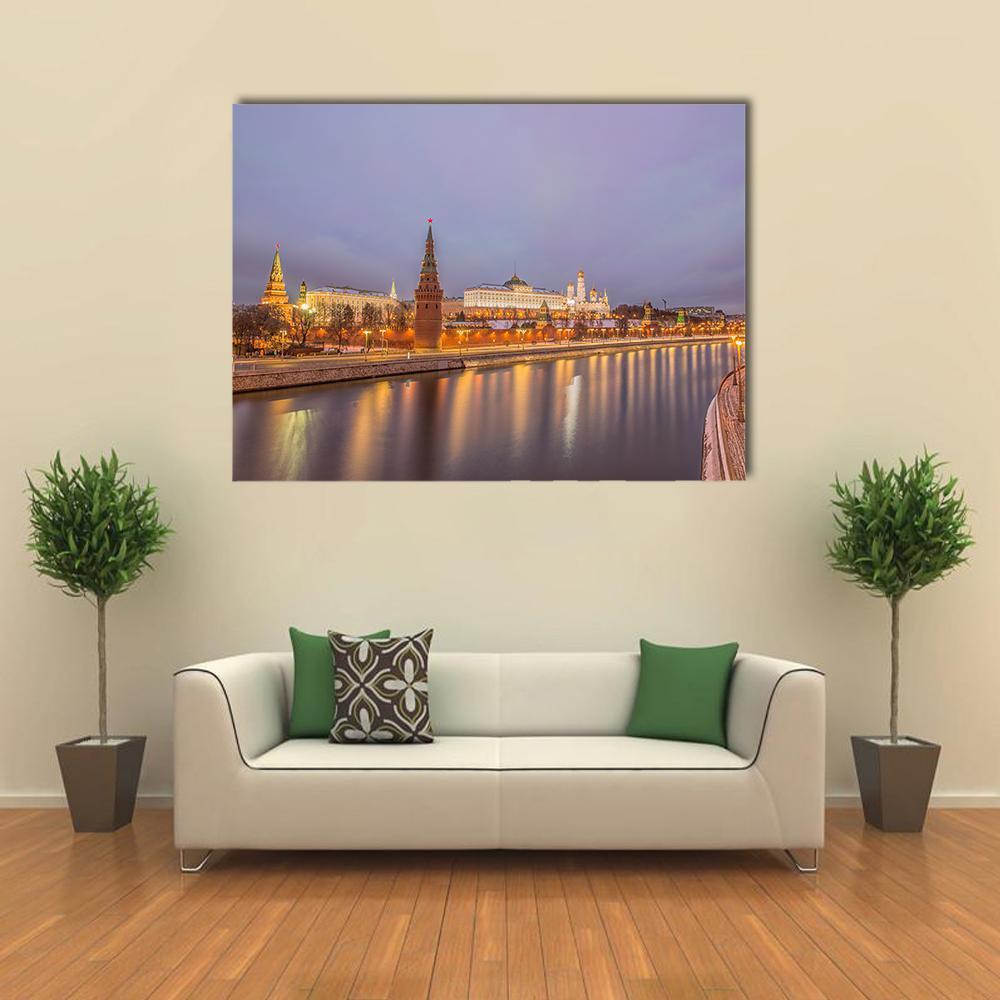 Moscow Kremlin Evening Reflections Canvas Wall Art in gold, yellow and purple, single panel hung on a wall