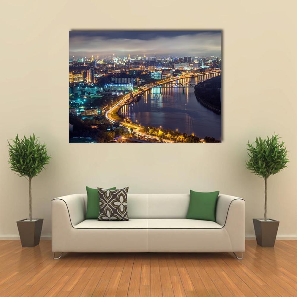 Moscow River at Night Canvas Wall Art in black, yellow and blue, single panel hung on a wall