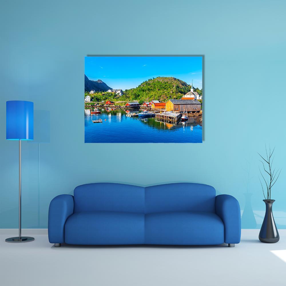 Moskenes Fishing Village Canvas Wall Art in green and blue, single panel hung on a wall