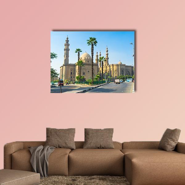 Mosque of Sultan Hassan Canvas Wall Art in beige, brown and blue, single panel hung on a wall