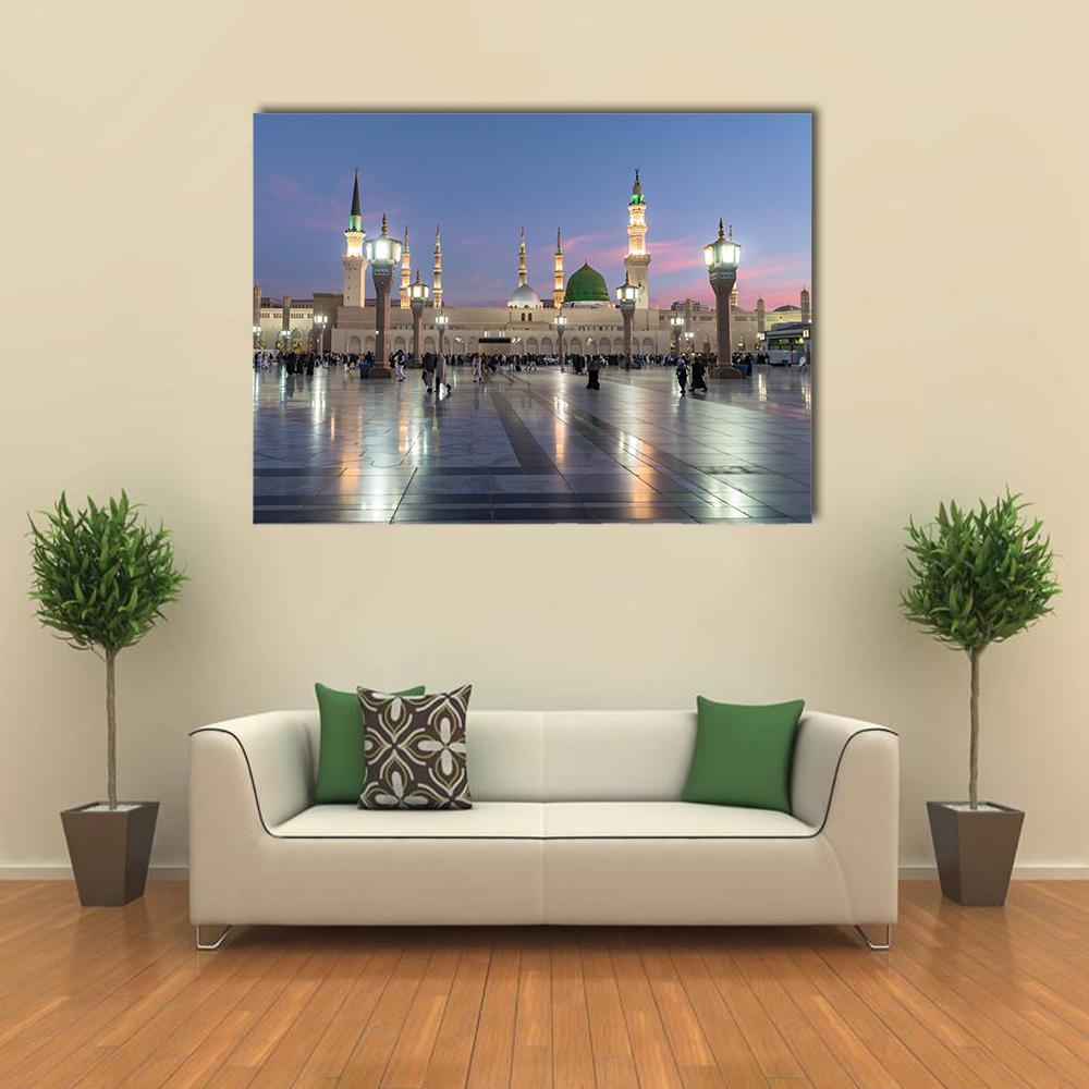 Prophet's Mosque Medina at Twilight Canvas Wall Art in beige, blue and pink, single panel hung on a wall