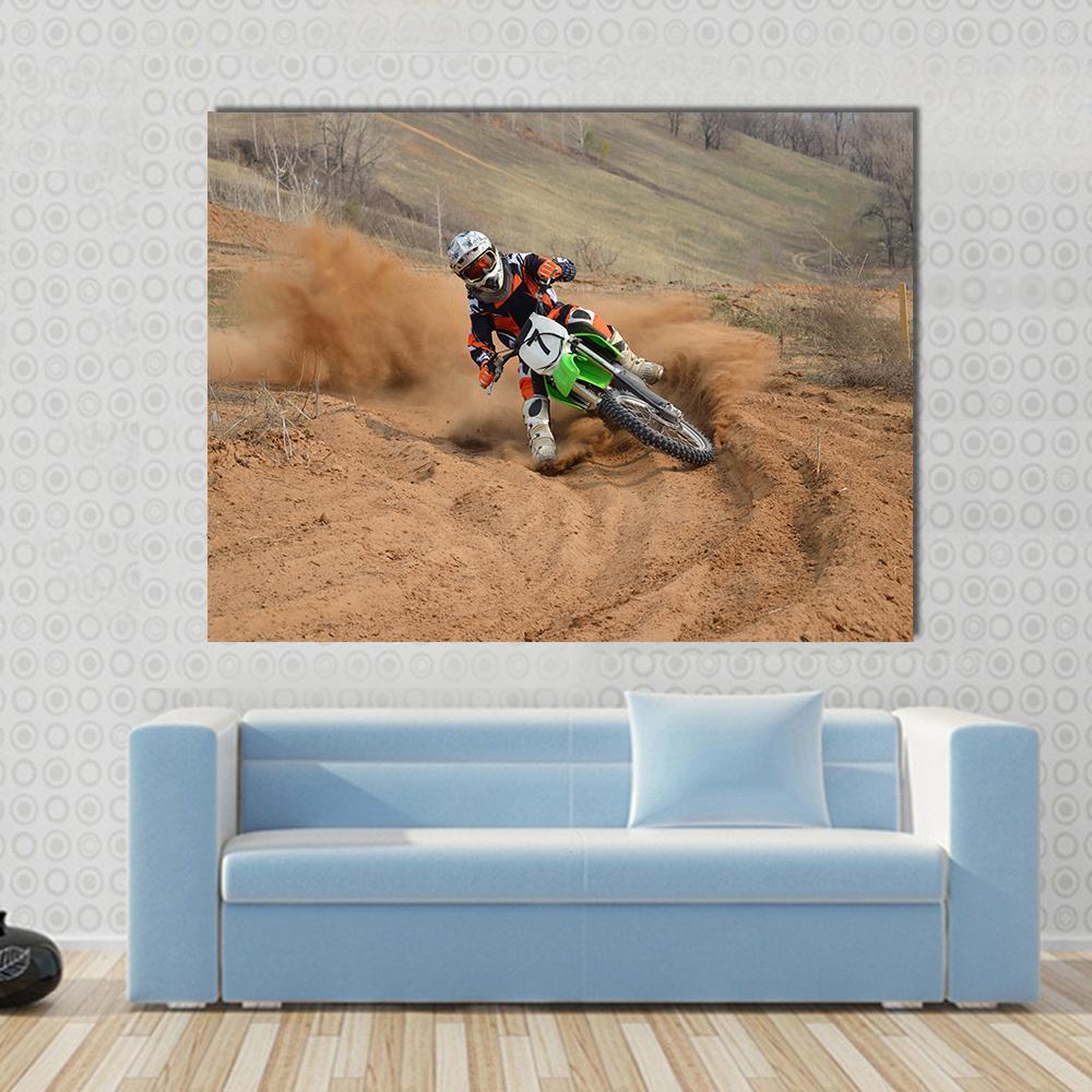 Motocross Rider on Green Kawasaki Canvas Wall Art in brown, orange and green, single panel hung on a wall
