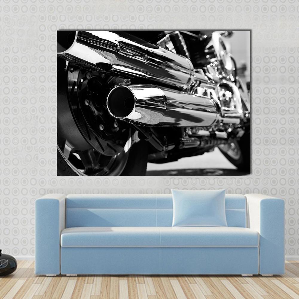 Motorcycle Exhaust Pipes Canvas Wall Art in black, gray and silver, single panel hung on a wall