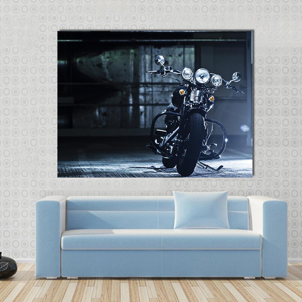 Motorbike in Garage Canvas Wall Art in black, silver and blue, single panel hung on a wall