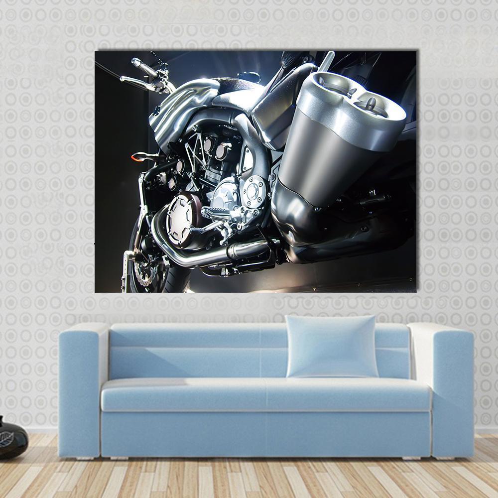 Motorbike Big Exhaust Pipe Canvas Wall Art in black, gray and silver, single panel hung on a wall