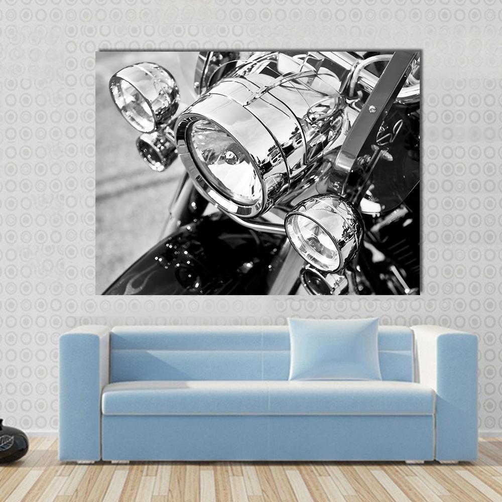 Motorcycle Lights Close Up Canvas Wall Art in black, gray and silver, single panel hung on a wall